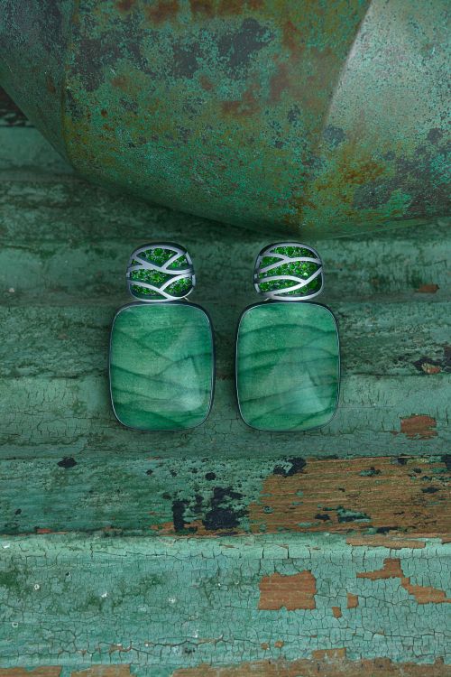 Hemmerle earrings with jasper and demantoid garnets set in silver and white gold. (Leo Bieber)