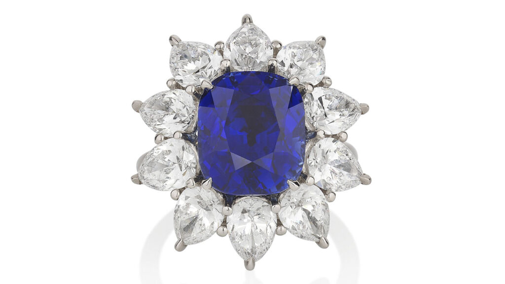 Ceylon sapphire within a diamond halo ring