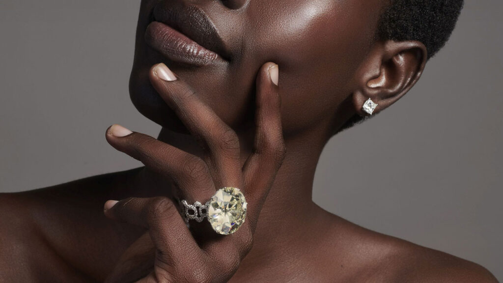 Model wearing yellow diamond ring image