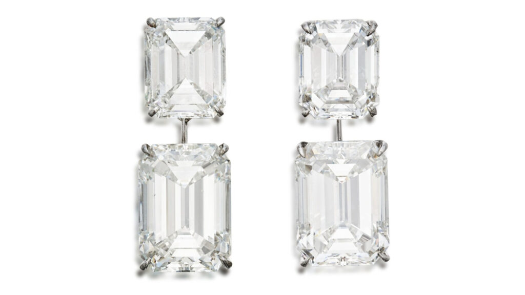 Two emerald-cut diamond earrings image