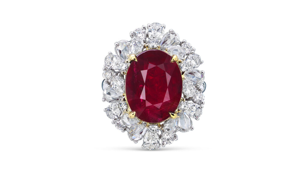Oval-cut Mozambican ruby surrounded by diamonds ring image