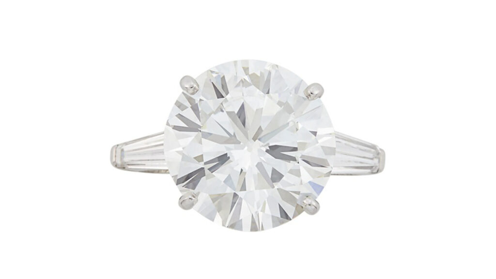 Round diamond with baguette diamond side stones ring at Doyle image