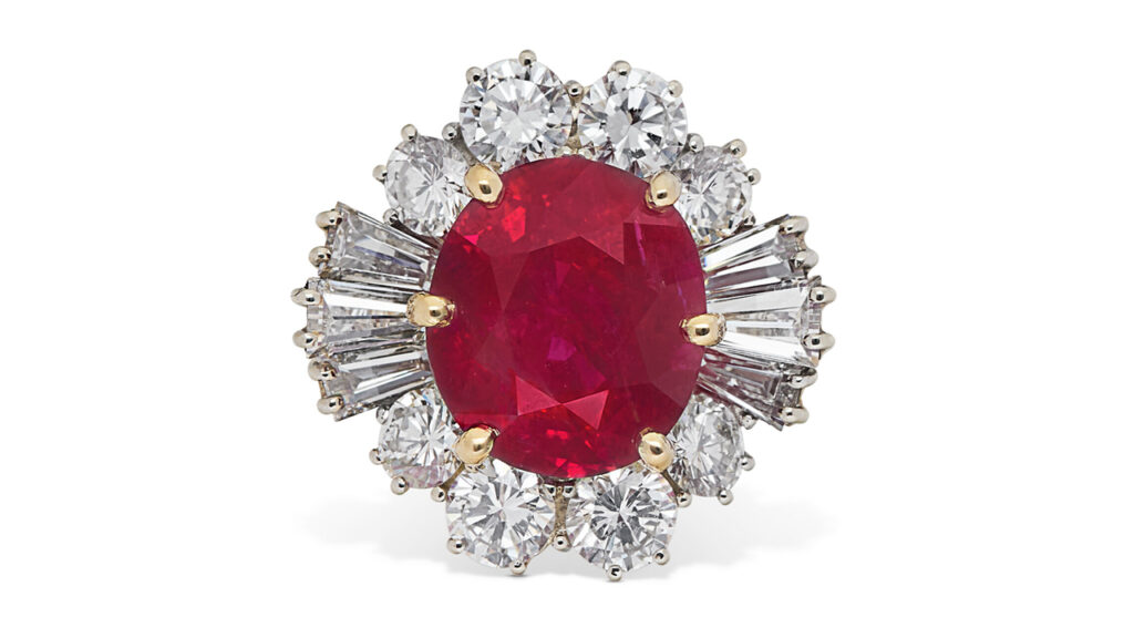 Burmese ruby within a surround of round and tapered baguette-cut diamonds ring at Christie's image
