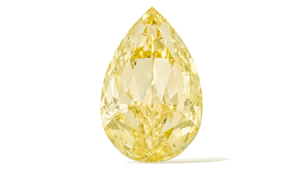 Unmounted fancy-intense-yellow diamond at Christie’s image