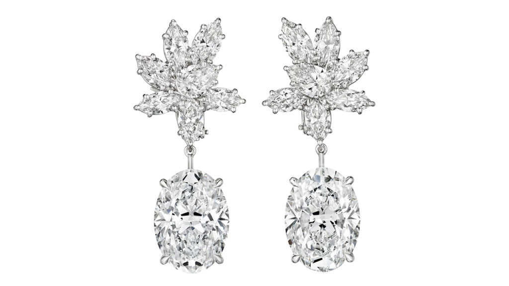 Harry Winston earrings with clusters of pear and marquise-shaped diamonds suspending two oval brilliant-cut diamonds at Christie's image