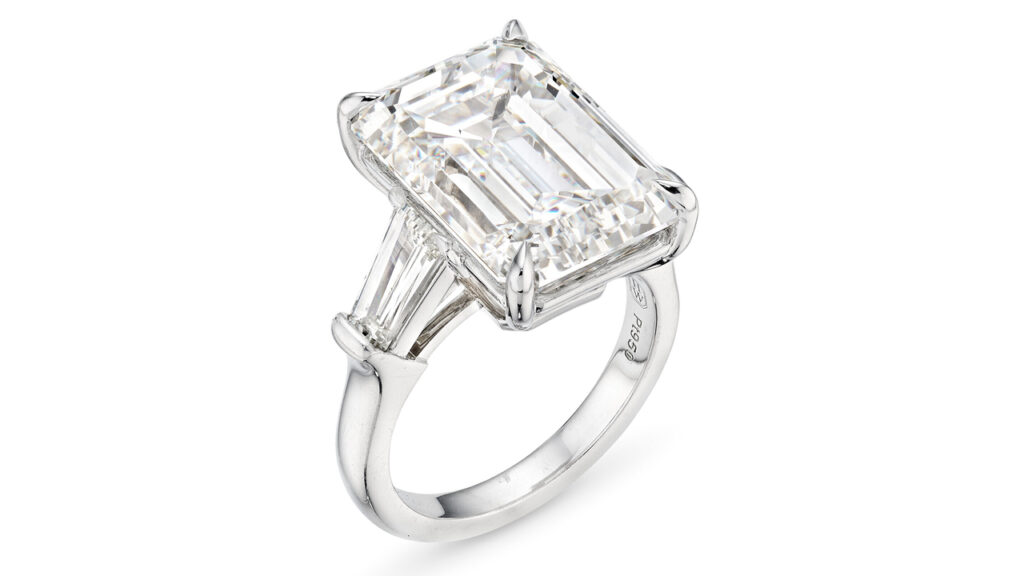 Harry Winston ring featuring an emerald-cut flawless diamond center stone between two tapered baguette-cut diamonds at Christie's image
