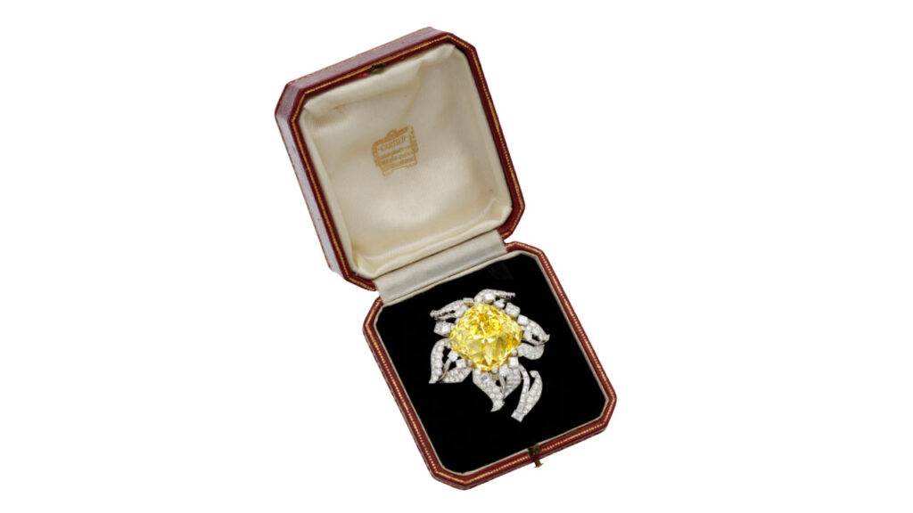 Fancy-intense-yellow Allnatt diamond in a Cartier brooch from Sotheby’s image