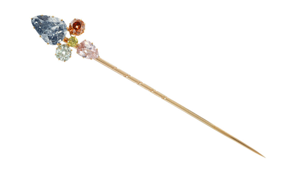 Early-20th-century tie pin featuring a fancy-grey-blue diamond and colored diamonds, which sold at Sotheby’s image