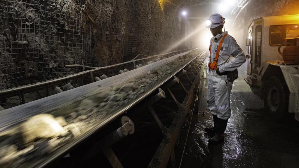 Miner inspecting Petra's Finsch diamond mine image