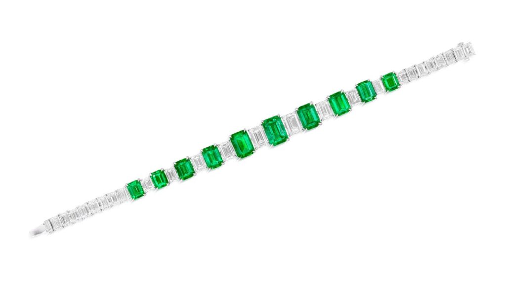 Bracelet containing 10 graduated step-cut Colombian emeralds as well as emerald-cut diamonds at Phillips image