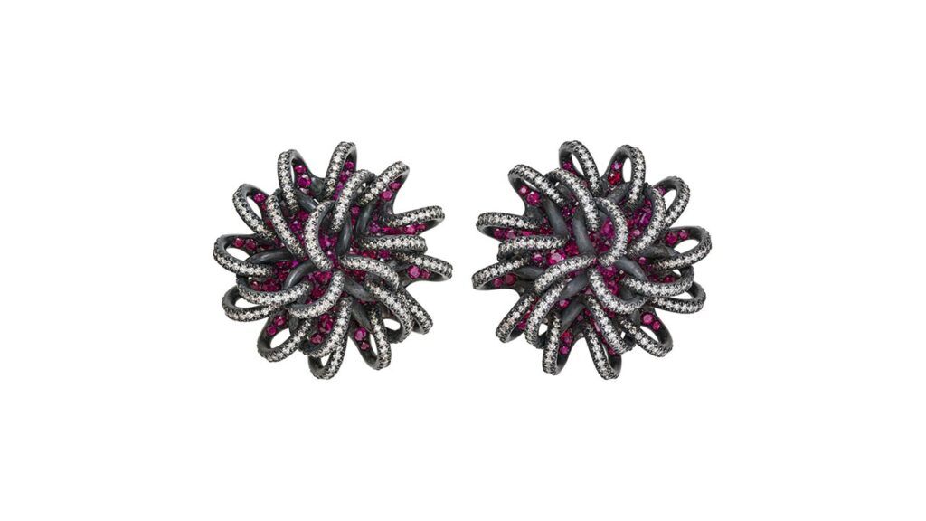 Spiraling Thread earrings featuring round rubies and diamonds at Christie's image