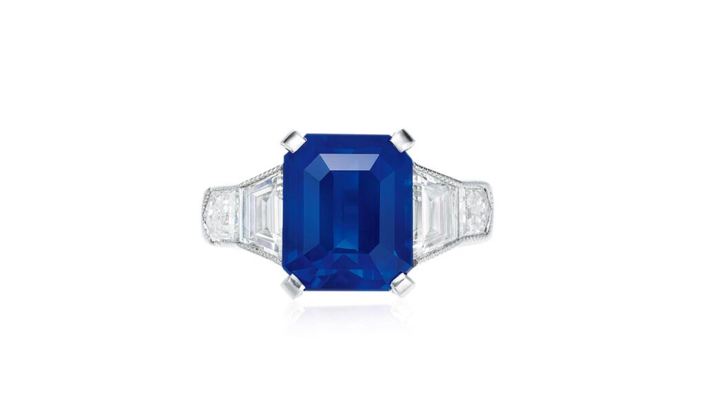 Rectangular-shaped, Kashmir sapphire ring with diamond side stones at Poly Auction image