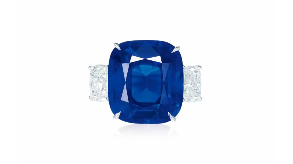 Cushion-shaped Madagascan sapphire with diamond side stones at Poly Auction image