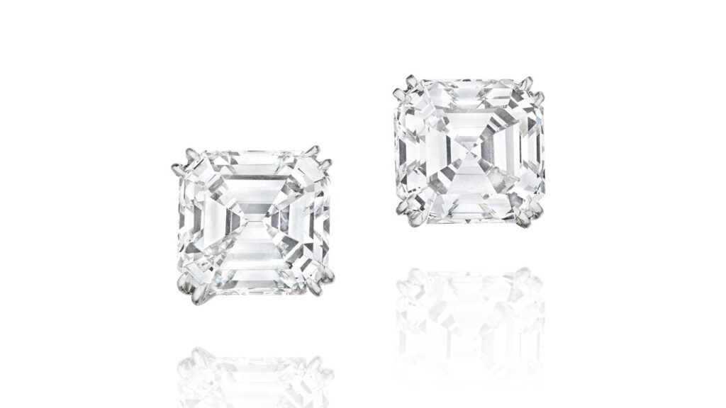 Pair of Taffin ear clips featuring square emerald-cut, D-color diamonds at Bonhams image