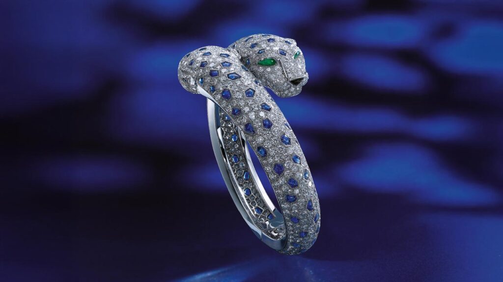 Cartier sapphire, emerald and diamond bracelet at Bonhams image