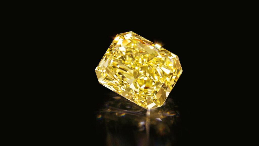 Unmounted yellow diamond at Bonhams image