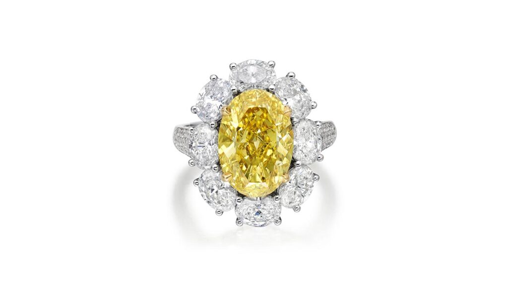 Fancy-vivid yellow diamond ring at Phillips image