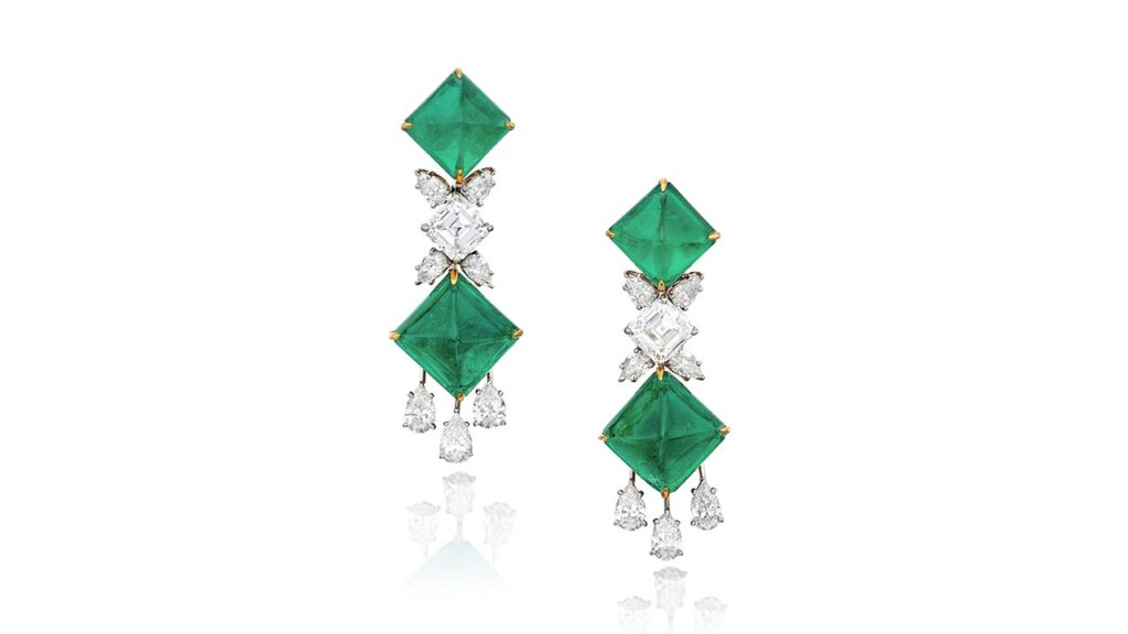 Graff earrings featuring four sugarloaf cabochon Colombian emeralds, two square emerald-cut, G-color diamonds, as well as 14 pear-shaped diamonds at Sotheby's image