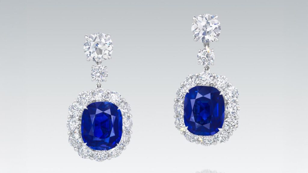 Earrings bearing cushion-shaped Kashmir sapphires, suspended from old European brilliant-cut diamonds at Christie's image
