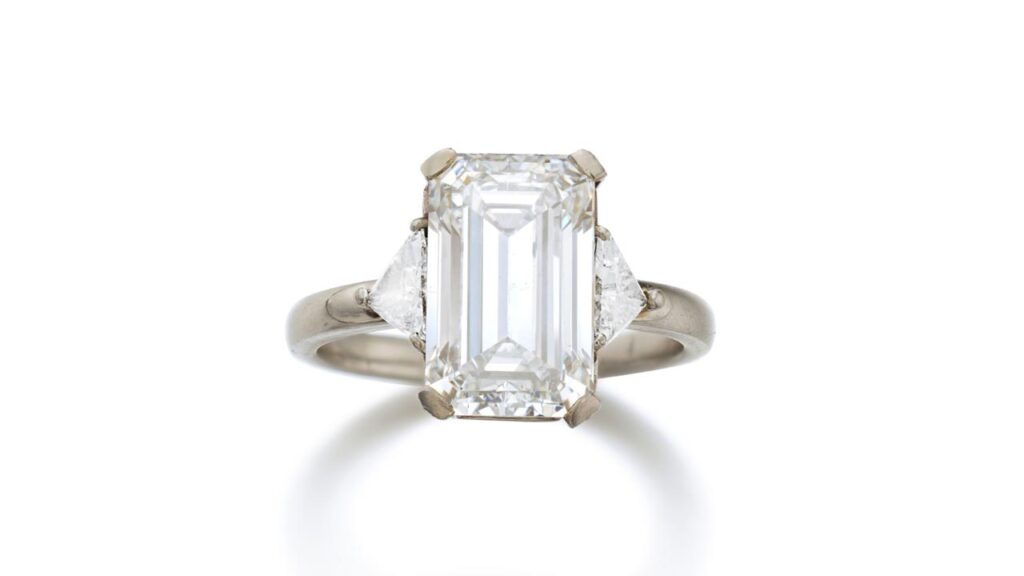 Step-cut with triangular diamonds ring at Sotheby's image