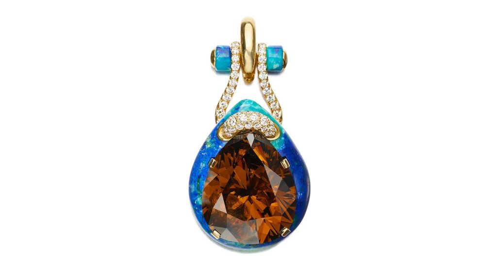 Deep-orange-brown diamond within a carved azurmalachite frame David Webb pendant at Sotheby's image