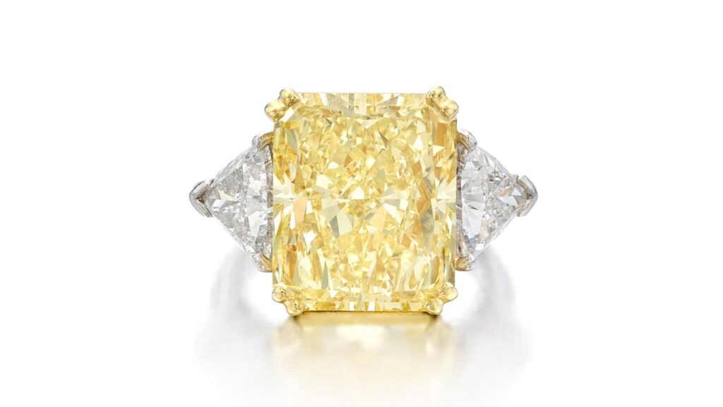 Cut-cornered rectangular brilliant fancy-yellow diamond ring at Sotheby's image