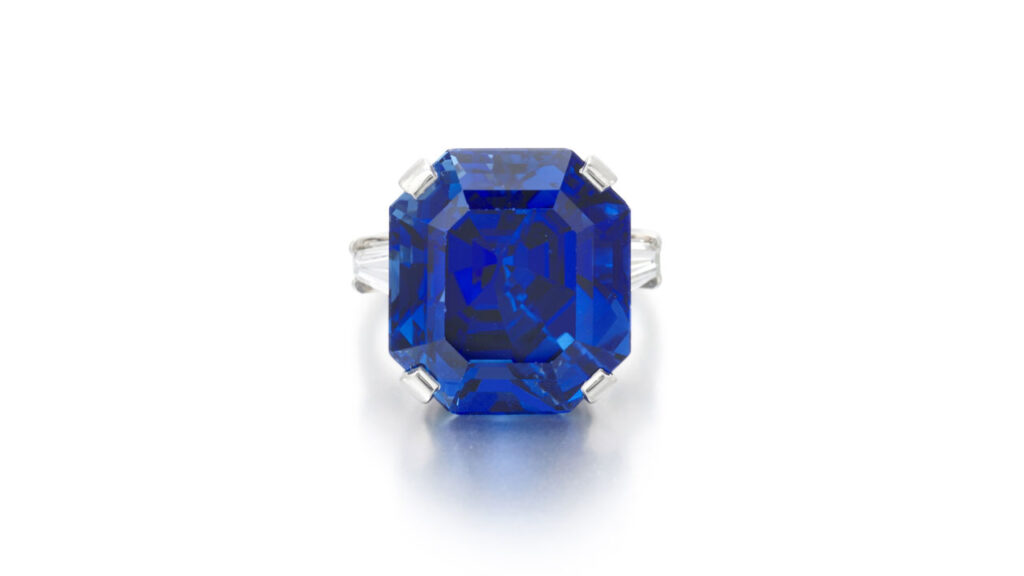 Bulgari ring bearing a step-cut sapphire between tapered baguette diamonds at Sotheby's image