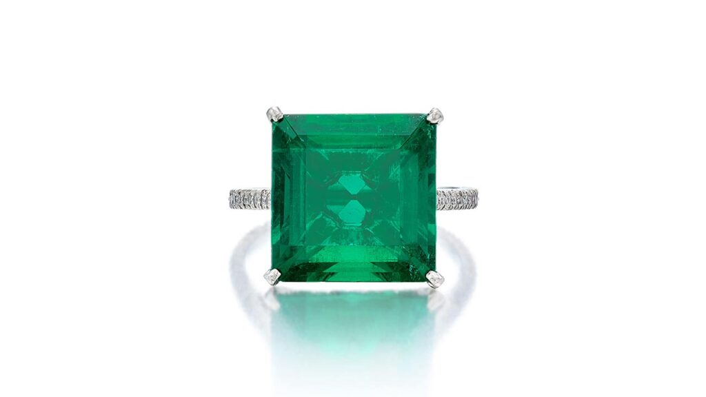 JCR ring containing a square emerald-cut Colombian emerald and a mounting pavé set with single-cut diamonds at Sotheby's image