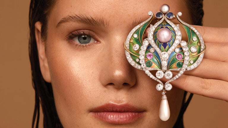 An enamel, pearl, diamond and gem-set jewel from Marcus & Co., which sold at Bonhams image