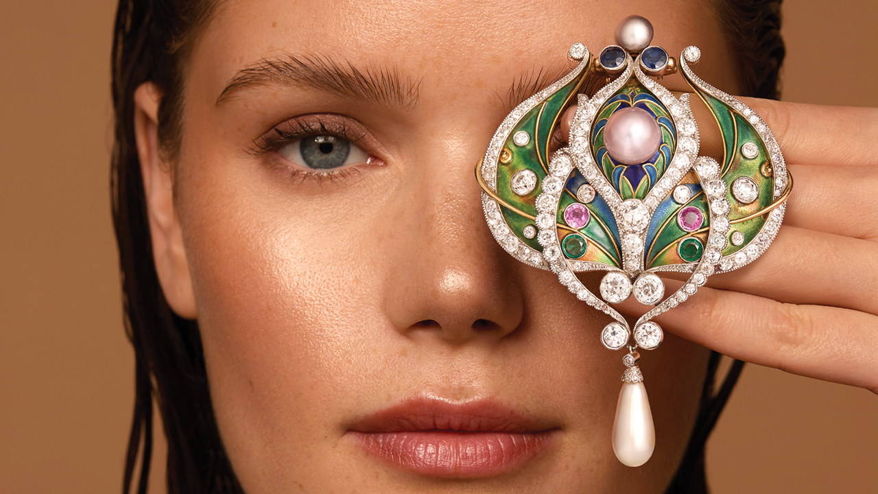 An enamel, pearl, diamond and gem-set jewel from Marcus & Co., which sold at Bonhams image