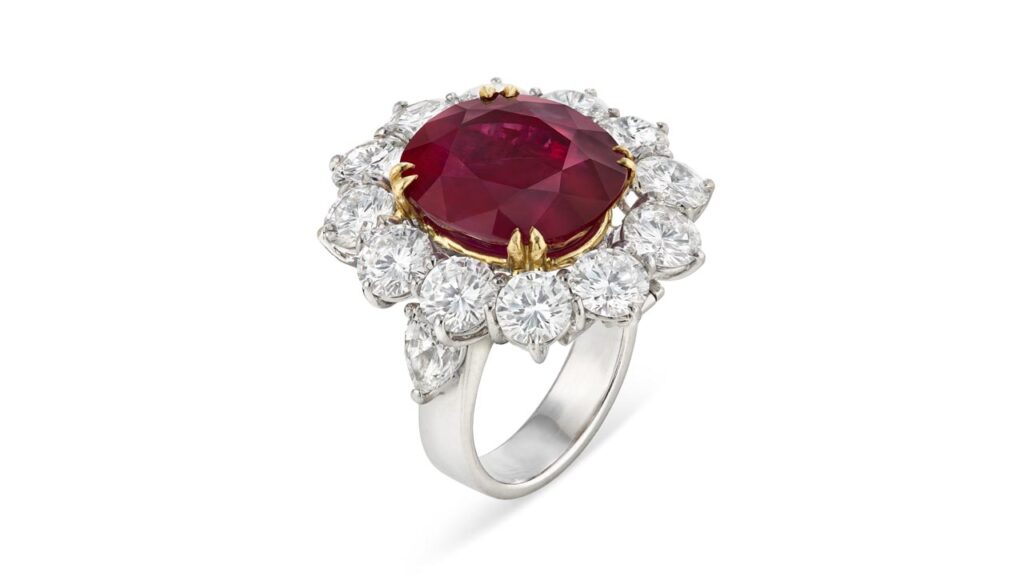 Ring featuring an oval mixed-cut Burmese ruby surrounded by round- and pear-shaped diamonds at Christie's image